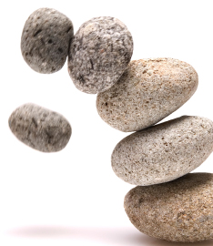 Stones tumbling out of balance
